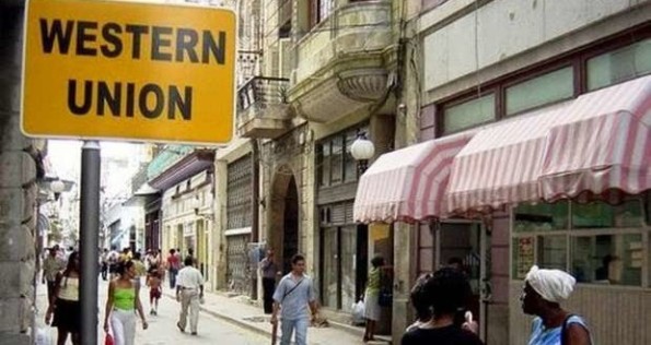 Photo: A branch of Western Union on Obispo Street, Old Havana. According to a manager of this company, 62 percent of Cuban homes receive remittances from the United States. Western Union has offices in 140 of the 158 municipalities in Cuba.